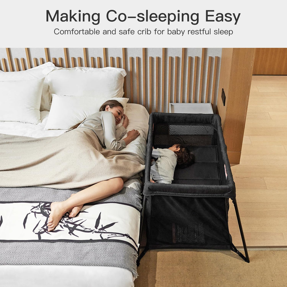 Gromast 2 in 1 travel crib mesh side for visibility and ventilation.