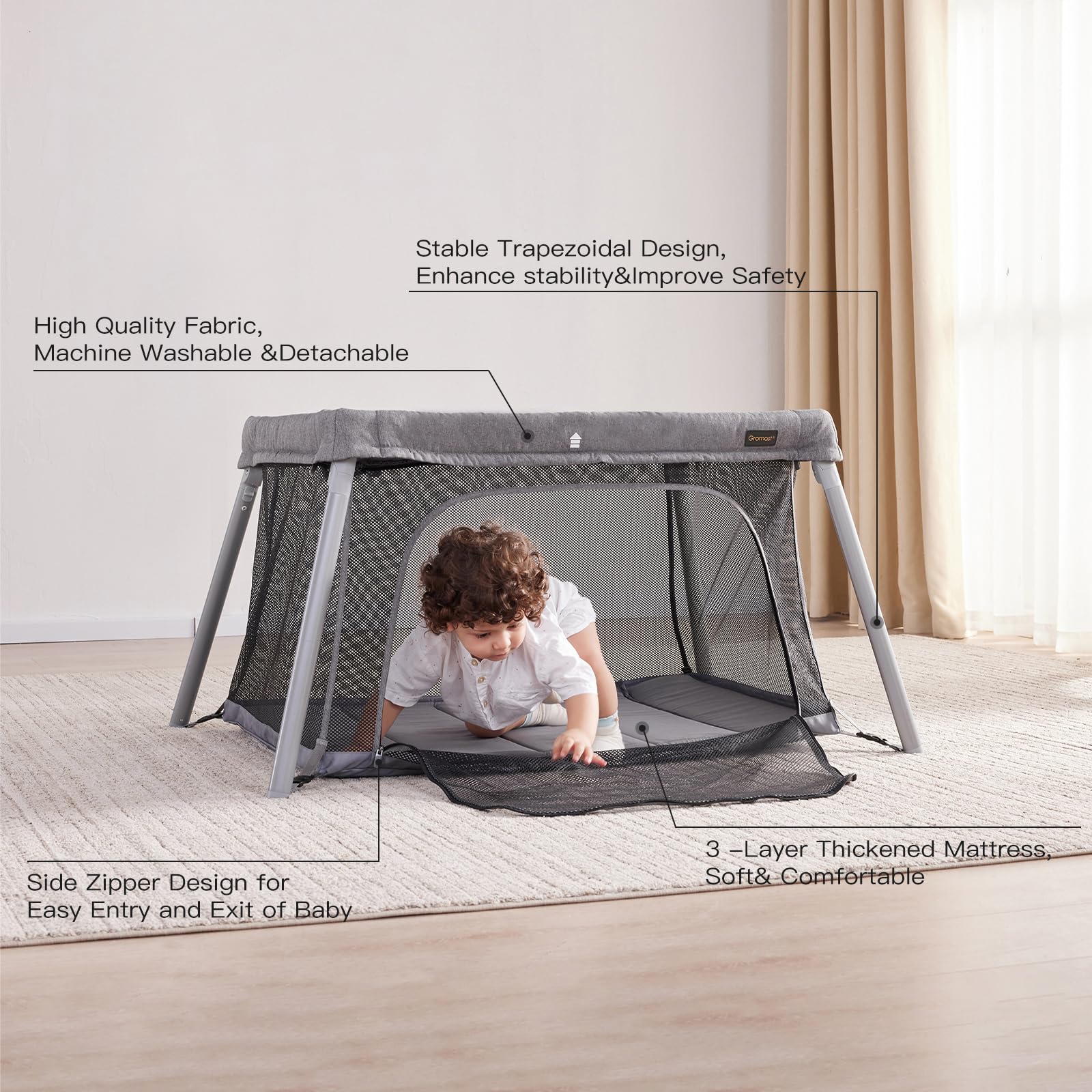 Gromast 2-in-1 travel crib zip door for easy baby access.