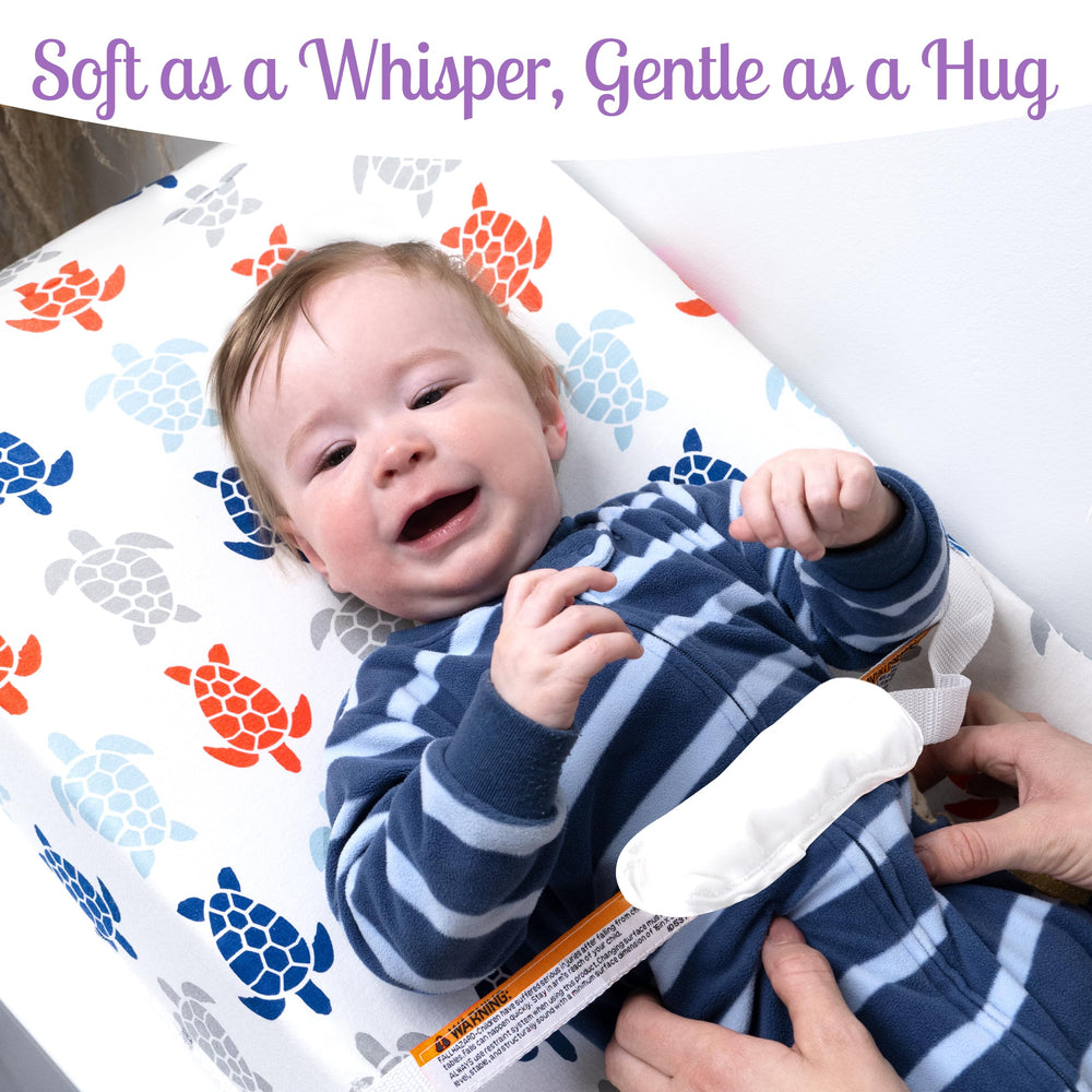 Grow Wild changing pad cover fits standard pads for a secure nursery setup.