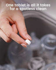 GROWNSY detergent tablets pour action demonstrates quick dissolve for spotless bottles.