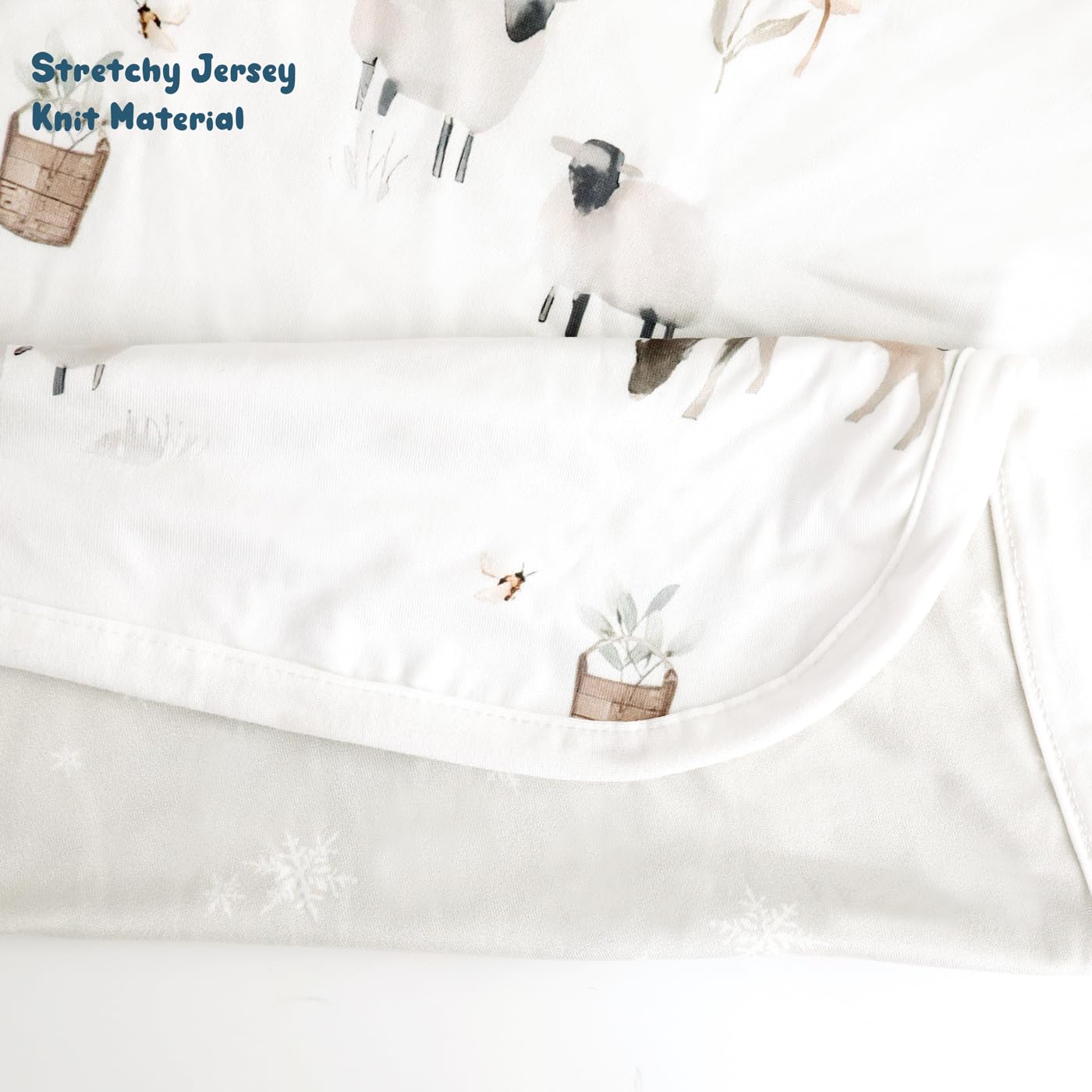 GRSSDER all-season comfort shown by blanket used as swaddle or lightweight quilt.