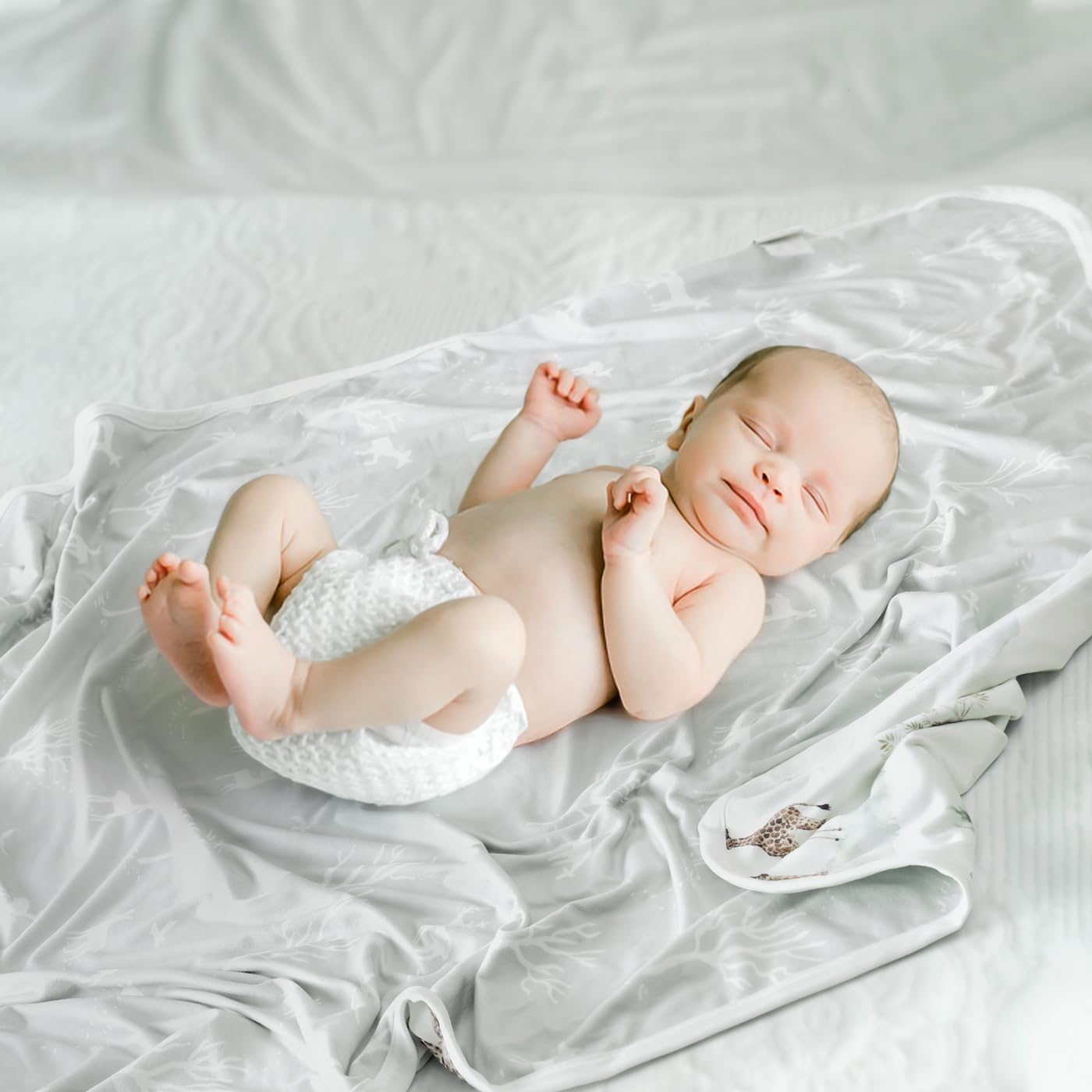 GRSSDER baby blanket in use for swaddling and snug comfort