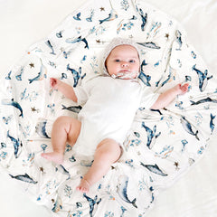 GRSSDER baby blanket in nursery decor setup complements modern nursery design.