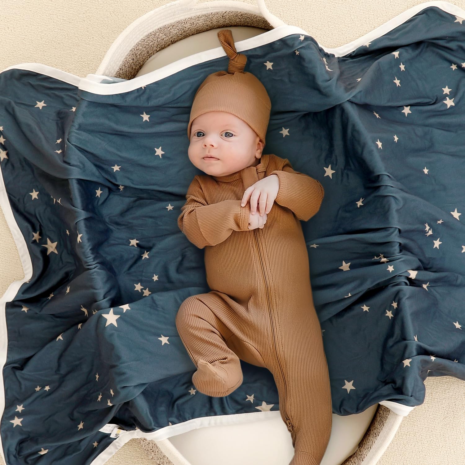GRSSDER blanket used as swaddle and cozy nap companion