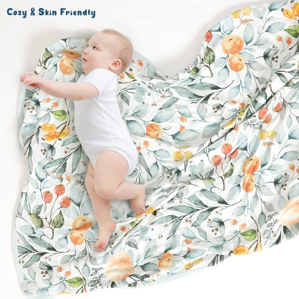 GRSSDER modern nursery designs pair with soft pink and fruit prints.