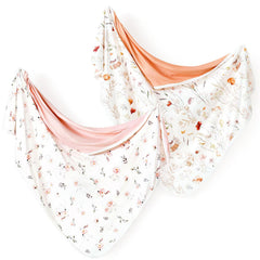 GRSSDER Baby Swaddle Blanket pink rose close-up shows soft jersey knit for gentle swaddling.