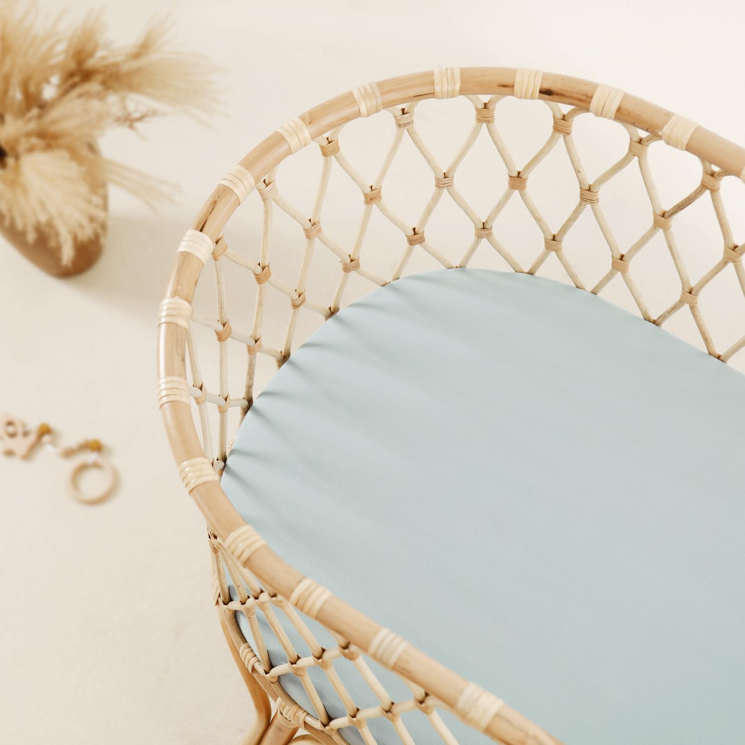 GRSSDER universal-fit bassinet sheet for oval and round shapes.