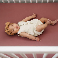 GRSSDER deep-pocket 9-inch crib sheet designed to stay put on deep mattresses.