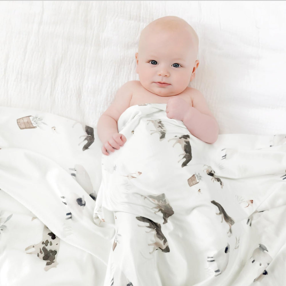 GRSSDER farm animals design swaddle blanket highlights playful print for boys and girls.