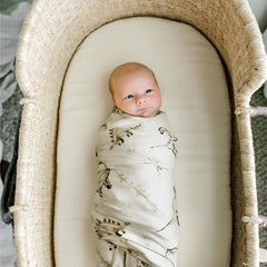 GRSSDER nursery styling scene featuring modern swaddle blanket and décor