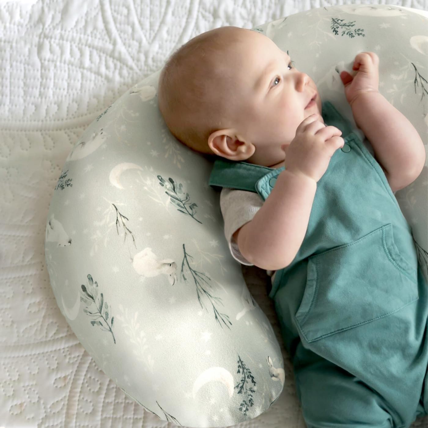 GRSSDER Snow Wolf pillow cover brightens nursery décor and inspires snuggly feeding sessions.
