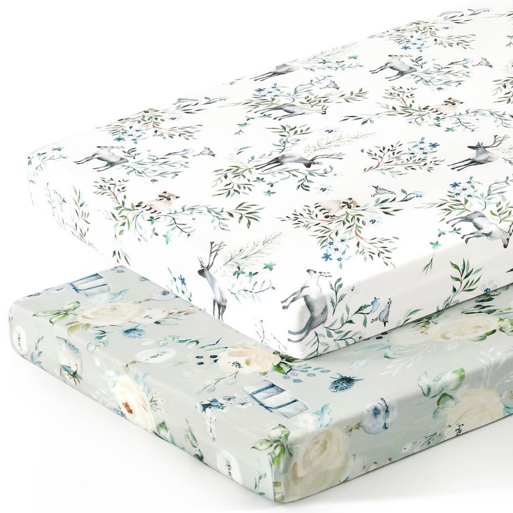 GRSSDER Pack n Play Sheets stretched on a mattress showing soft, breathable knit comfort.