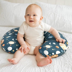 GRSSDER snug-fit image shows secure coverage for most curved nursing pillows and stability