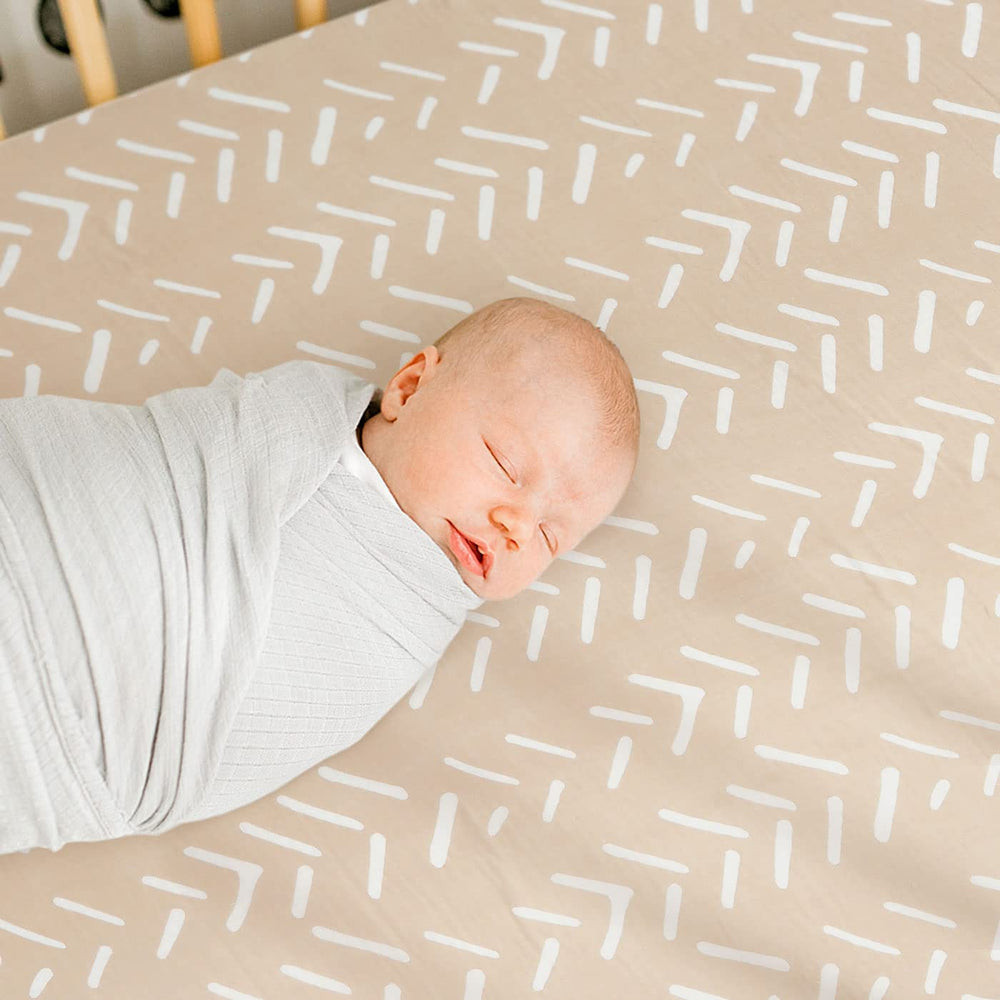 GRSSDER taupe stripe design adds gender-neutral nursery style.