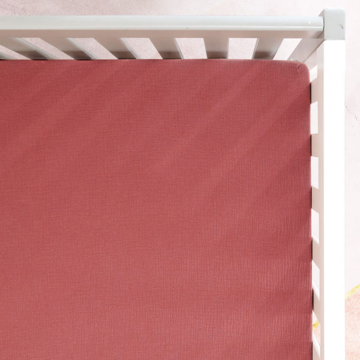 GRSSDER soft muslin crib sheet in wine red, gentle on baby's skin for all-night comfort.