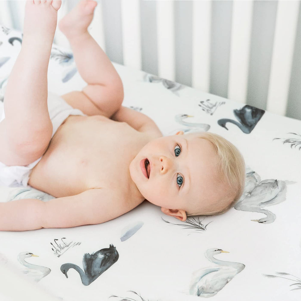 GRSSDER Stretch crib sheet universal fit securely hugs a standard crib mattress.