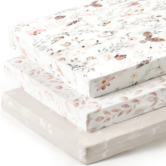 GRSSDER stretchy pack n play sheets in blush floral for soft, breathable comfort.