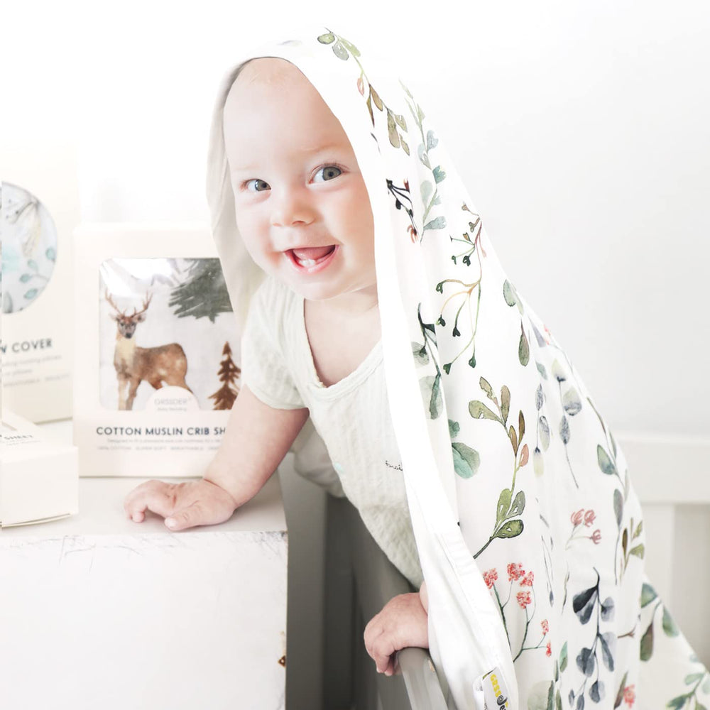 GRSSDER swaddle-utility image demonstrates nap-time and tummy-time use.