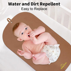 GUNTAIL changing mat opened on flat surface for quick, comfortable diaper changes.