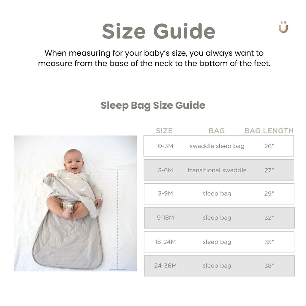 GUNAMUNA Swaddle Sleep Sack Woof worn by sleeping baby illustrating grow-with-me design