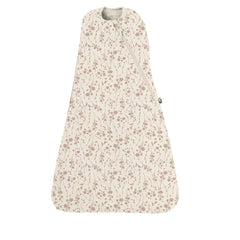 Gunamuna Swaddle Wrap Posie in arms-in mode for secure newborn sleep.