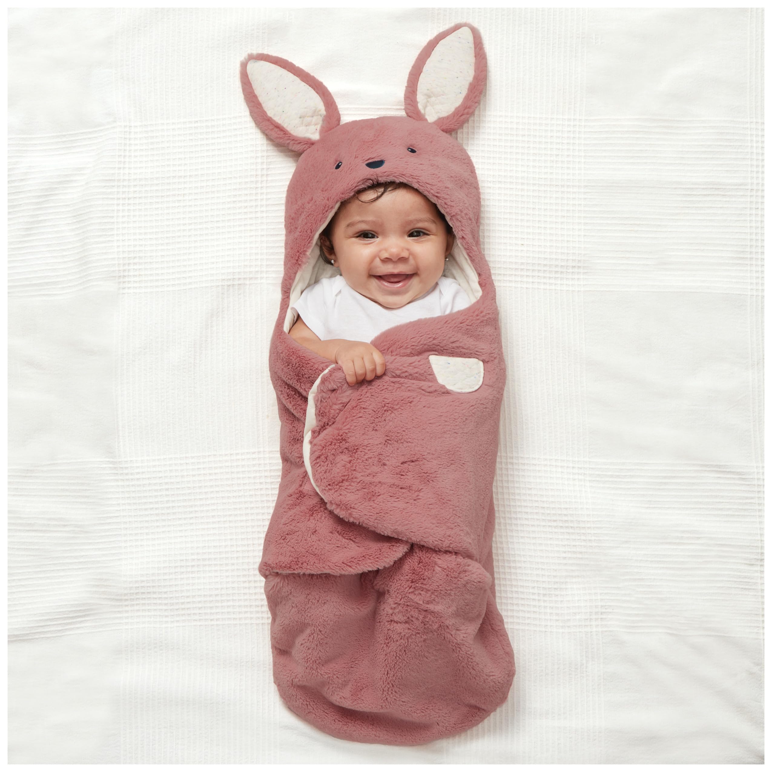 GUND hooded plush blanket for newborns provides secure head coverage and soft comfort.