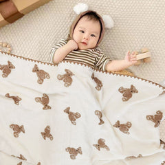 Gunnaicat 40x40 inch blanket displayed in a cozy nursery setting