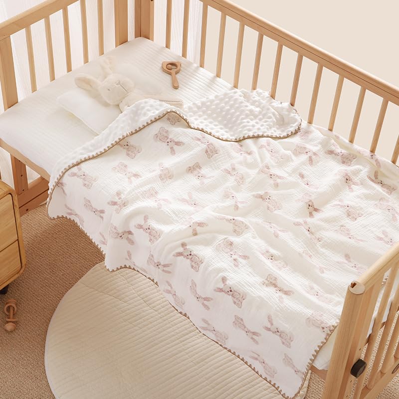 Gunnaicat blanket used as crib bedding for cozy toddler rest.