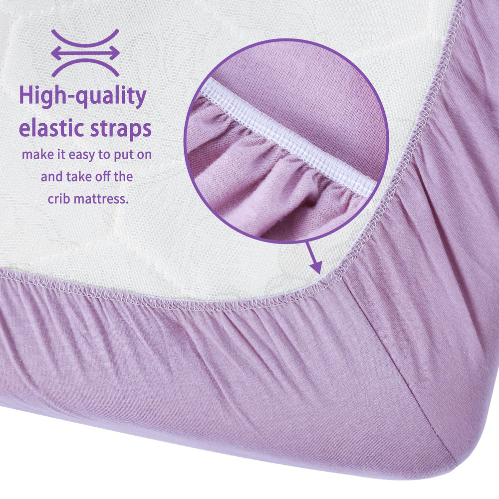 GUNTAIL purple and pink crib sheets brighten nursery ambiance.