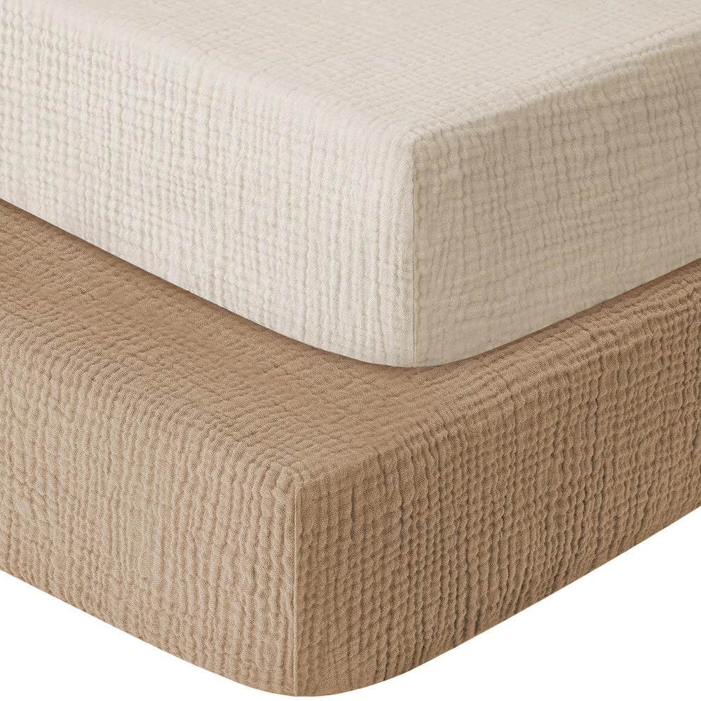 GUNTAIL muslin crib sheets close-up showing breathable fabric for baby's comfort.