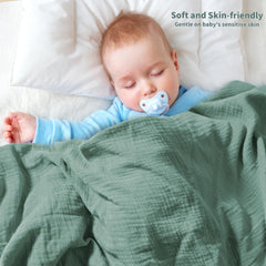 GUNTAIL nursery setup showing swaddle used as stroller cover.