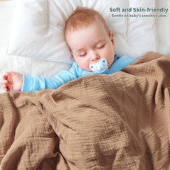 Close-up of Guntail muslin swaddle texture showing soft weave.