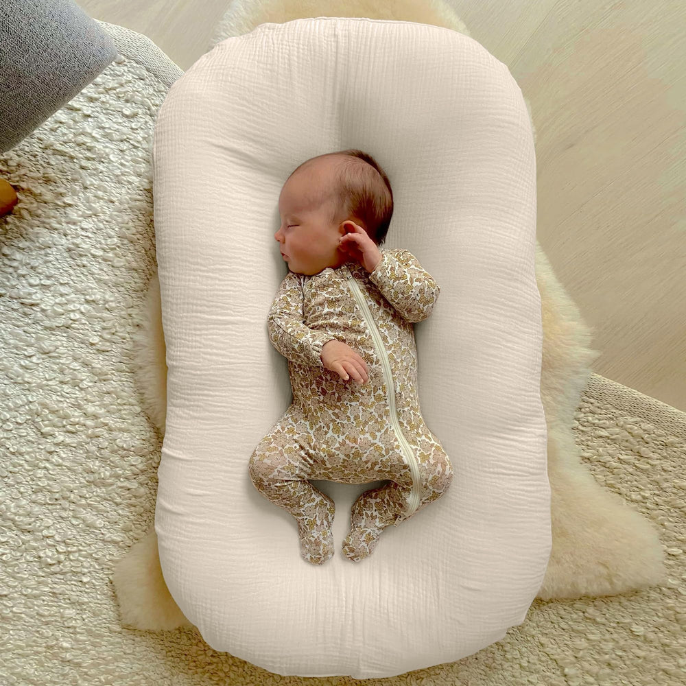 Guruixu muslin baby lounger cover machine washable for easy care.