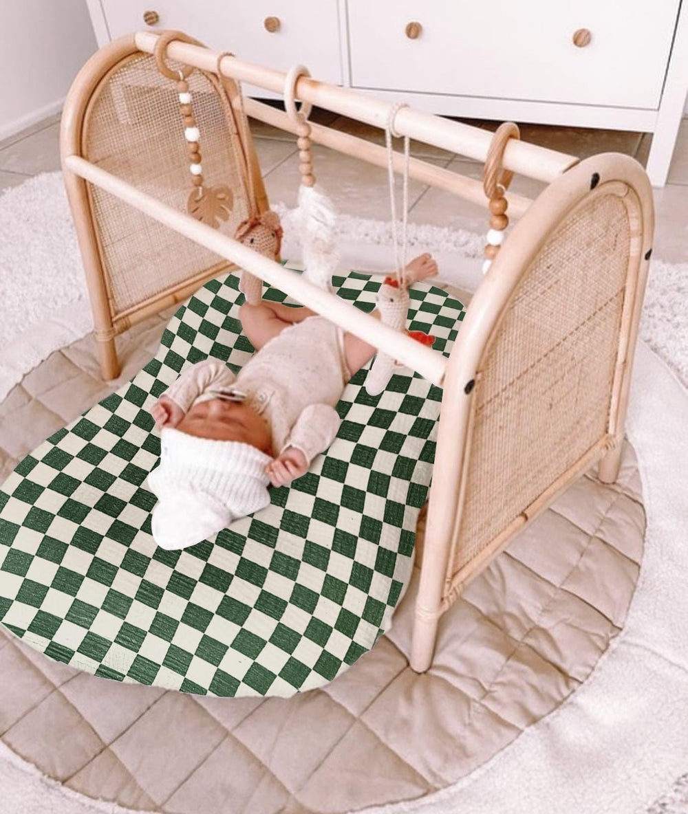Guruixu Muslin baby lounger cover machine-washable shot highlights convenient cleaning