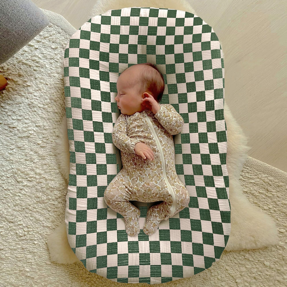 Guruixu Muslin baby lounger cover olive green closeup highlights soft touch for delicate skin