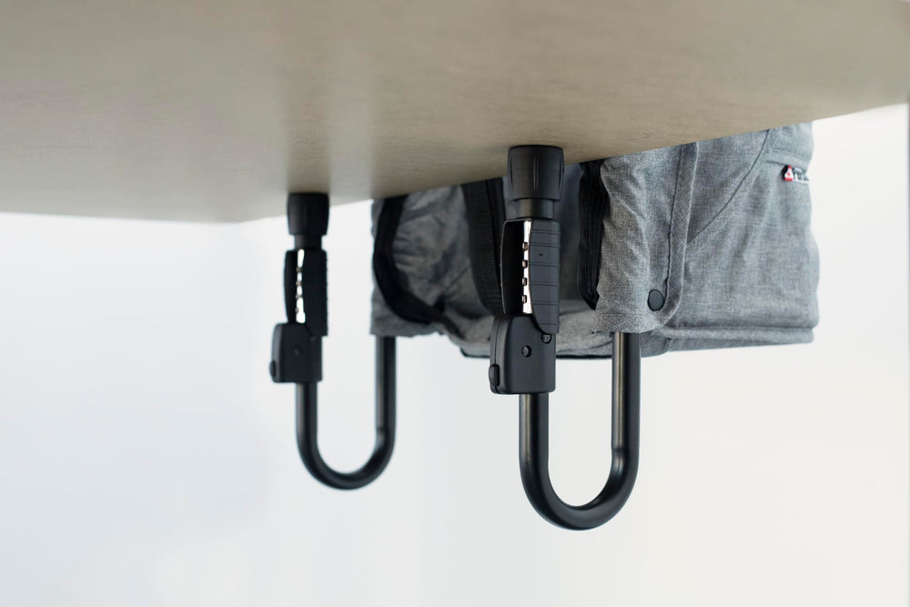 The guzzie+Guss Perch-clip-on-table-chair foldable-compact stores easily between uses.