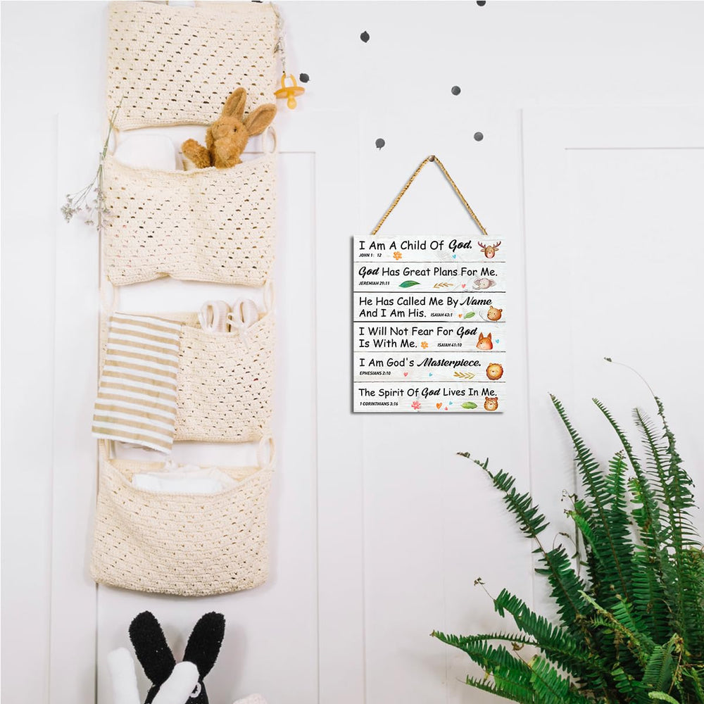 Gwisml I am a Child of God plaque in a nursery reading corner creates cozy spiritual ambience