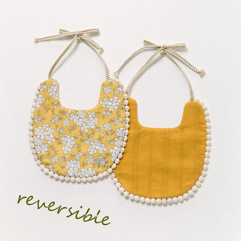 GZMM baby bib care instructions – gentle washing and flattening for longevity.