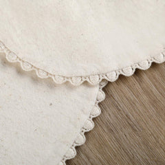 GZMM offwhite two-pack image emphasizes versatile, gentle daily bibs.