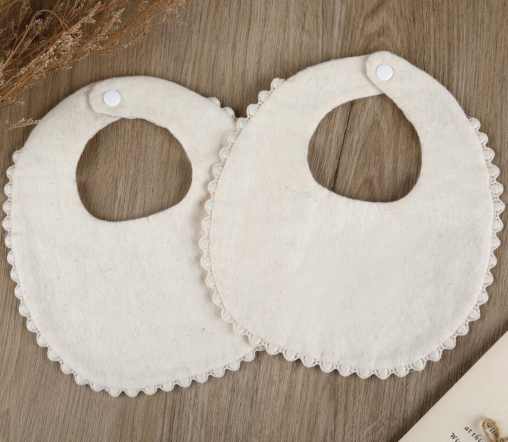 GZMM size 8.6-9.8 inches bib fits 0-12 months confidently.