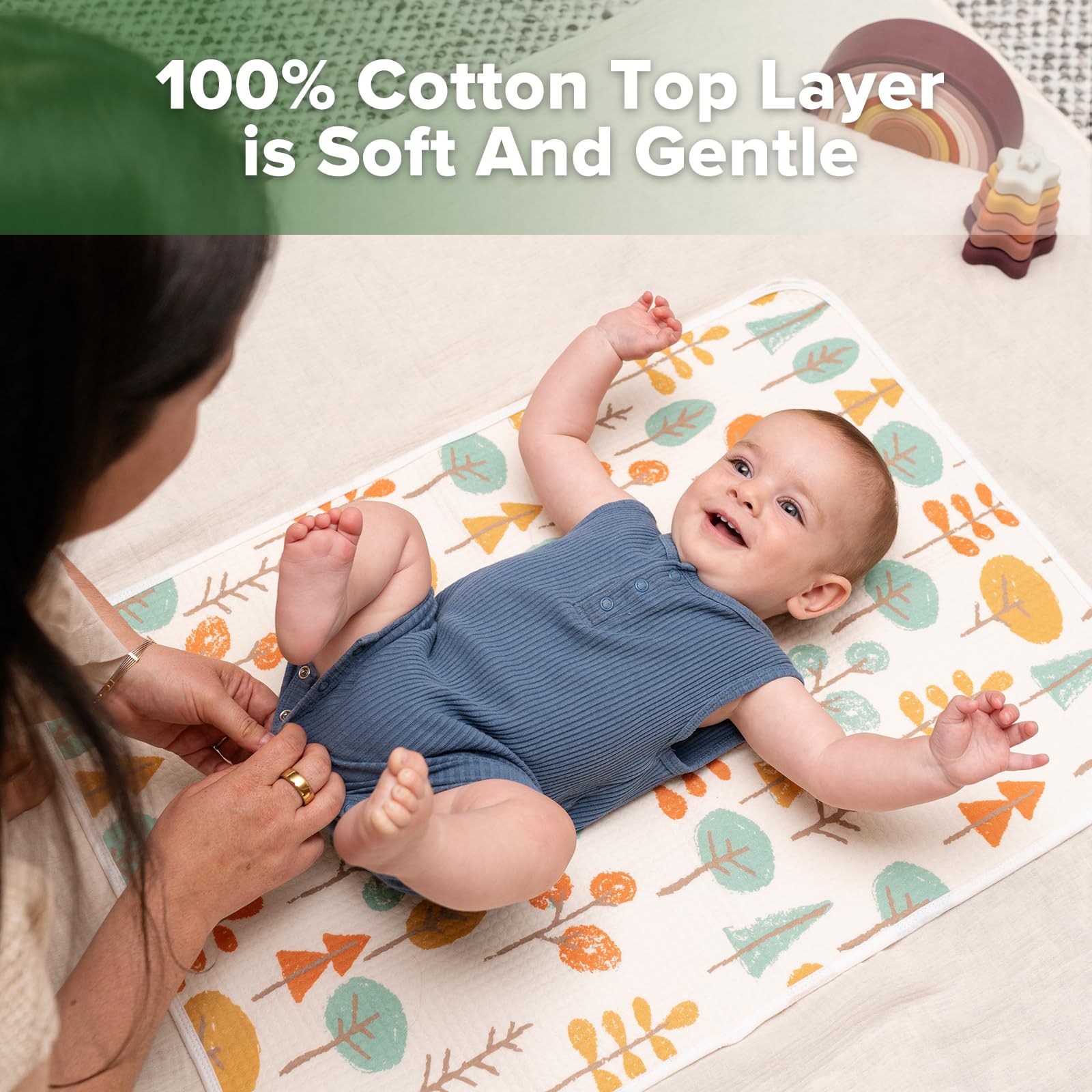 haakaa changing pad liner 100% cotton top layer, gentle against baby skin.