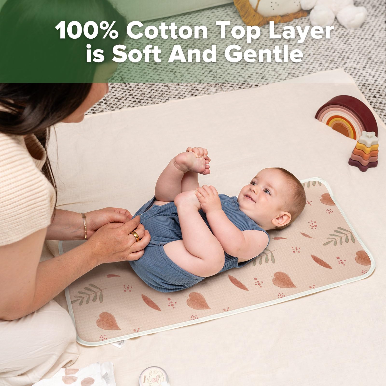 haakaa changing pad liner two-pack provides reusable mess protection.