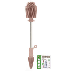 haakaa cleaning brush double-ended pink in action for versatile bottle and pump cleaning.