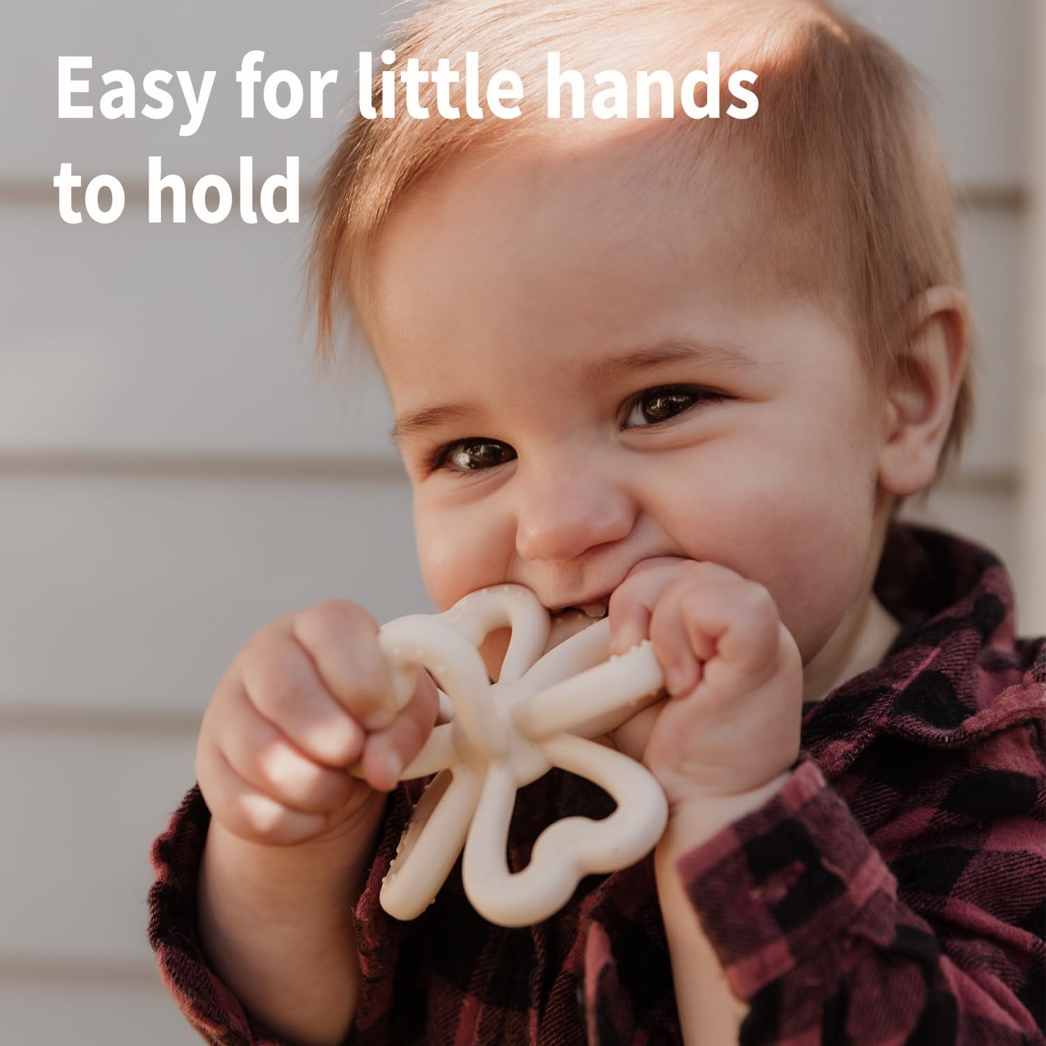 Haakaa Clover Teether copper detail ridges, textured gum massage for soothing relief.