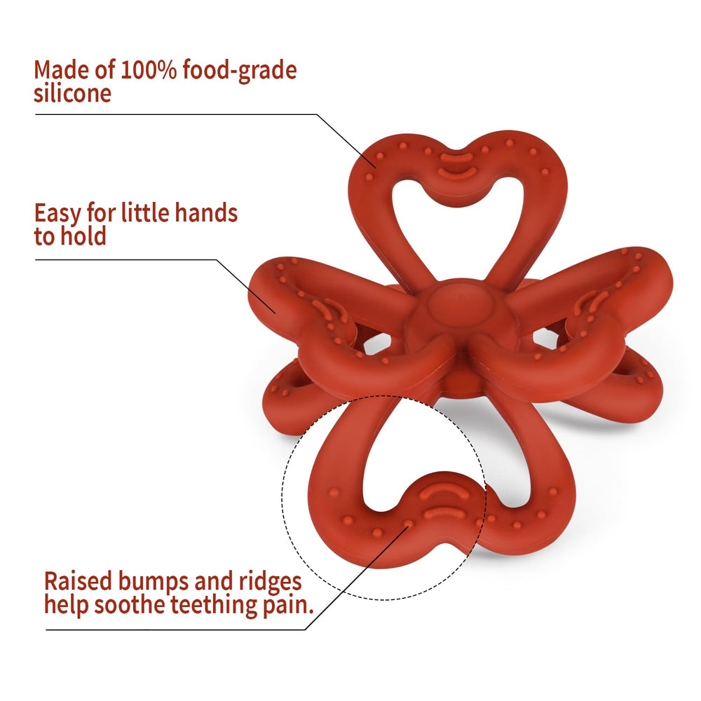 Haakaa Clover Teether copper in hand, baby-friendly chew toy for teething.