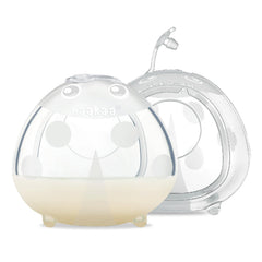 haakaa Ladybug Milk Collector worn inside bra for discreet let-down collection.