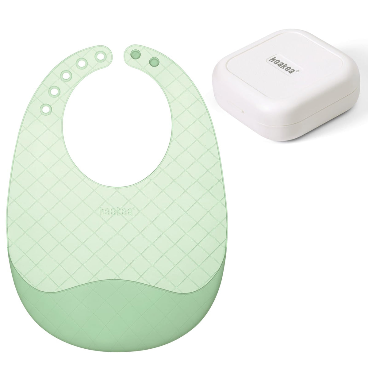 Haakaa lightweight pocket bib folded in palm case, ultra-portable for on-the-go meals