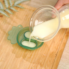 Haakaa mini nibble tray showing silicone compartments for convenient frozen bites.
