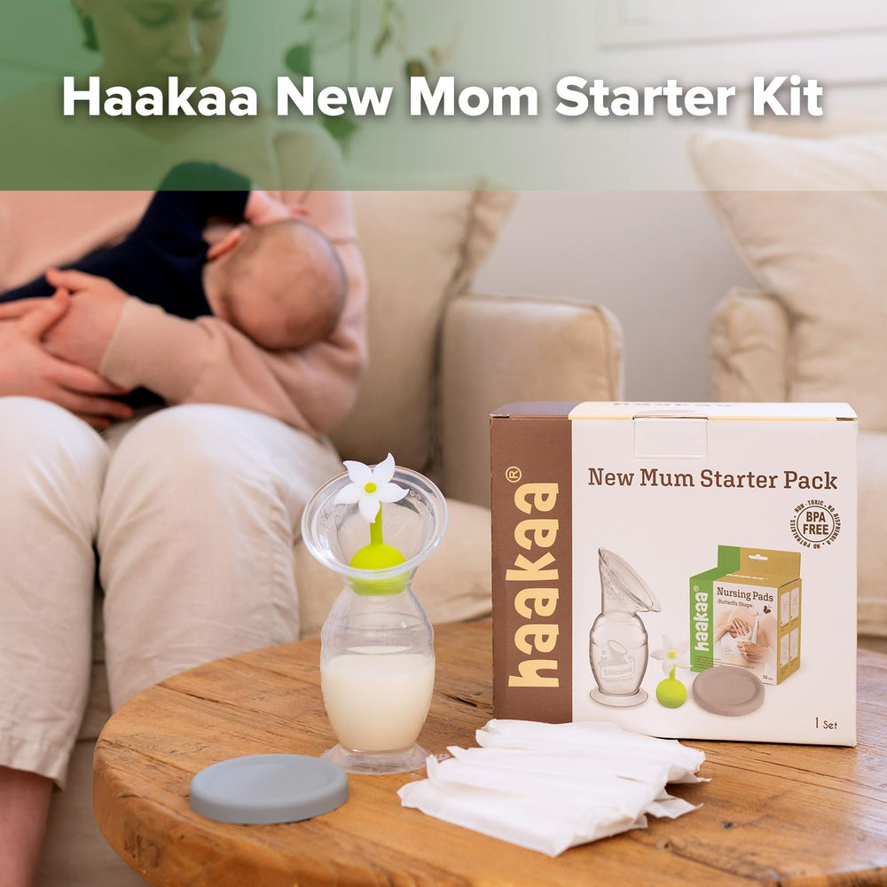 Haakaa new mum starter kit silicone-cap demonstration shows leak protection.