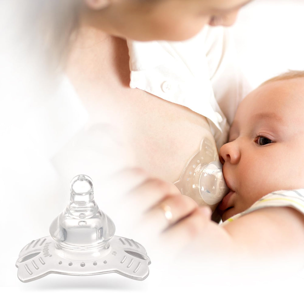 haakaa nipple shield chamber is squeezed to feed milk into the extended teat.